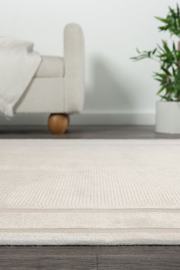 Emanate Cream Bordered Plain Indoor Rug