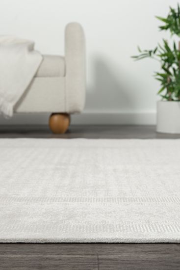 Emanate Cream Plain Living Room Rug