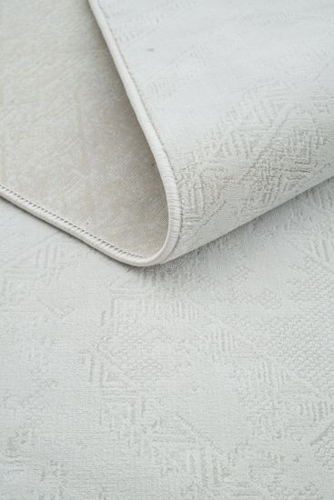 Coptria Cream Distressed Living Room Rug