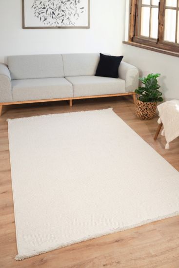 Loopi Cream Plain Area Rug