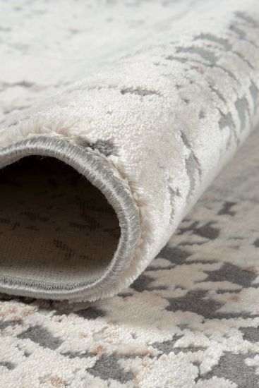 Gravitas Cream Abstract Area Rug